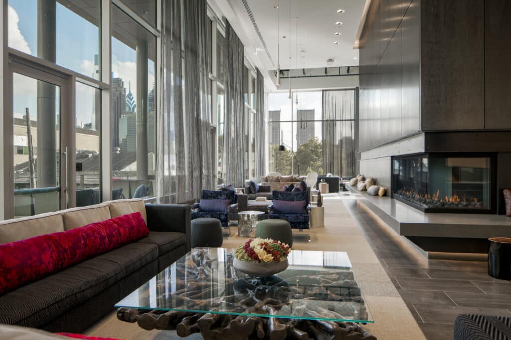 The lounge area of Dalian On The Park property, featuring contemporary design, comfortable seating, and a welcoming ambiance